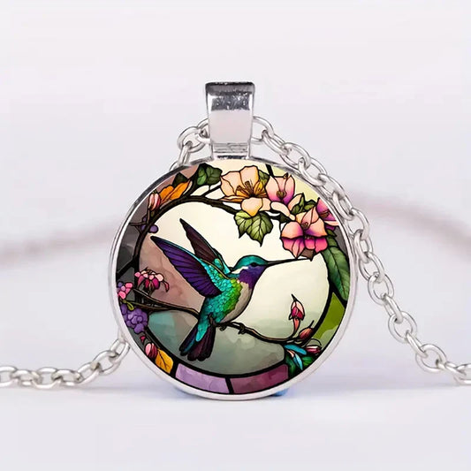 Collier pendentif avec dôme en verre en forme de colibri
